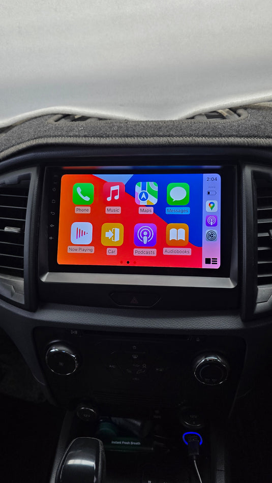 Ford Ranger wireless Apple CarPlay and Android Auto stereo upgrade kit is designed to maintain the functionality of the factory steering wheel control buttons, reverse camera, parking sensor display, and the display of AC and heater control informatio