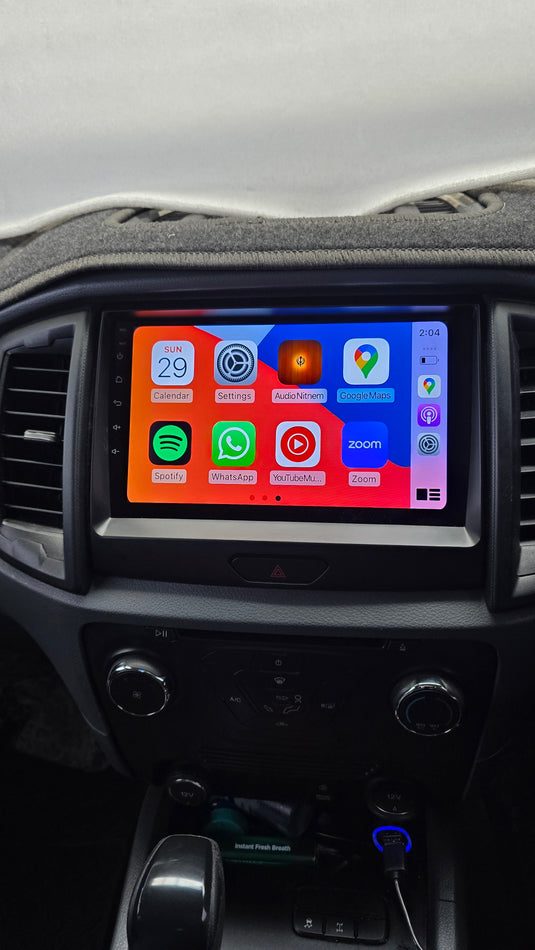 Ford Ranger wireless Apple CarPlay and Android Auto stereo upgrade kit is designed to maintain the functionality of the factory steering wheel control buttons, reverse camera, parking sensor display, and the display of AC and heater control informatio