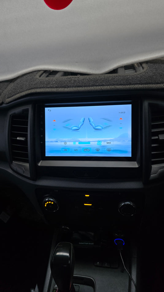 Ford Ranger wireless Apple CarPlay and Android Auto stereo upgrade kit is designed to maintain the functionality of the factory steering wheel control buttons, reverse camera, parking sensor display, and the display of AC and heater control informatio